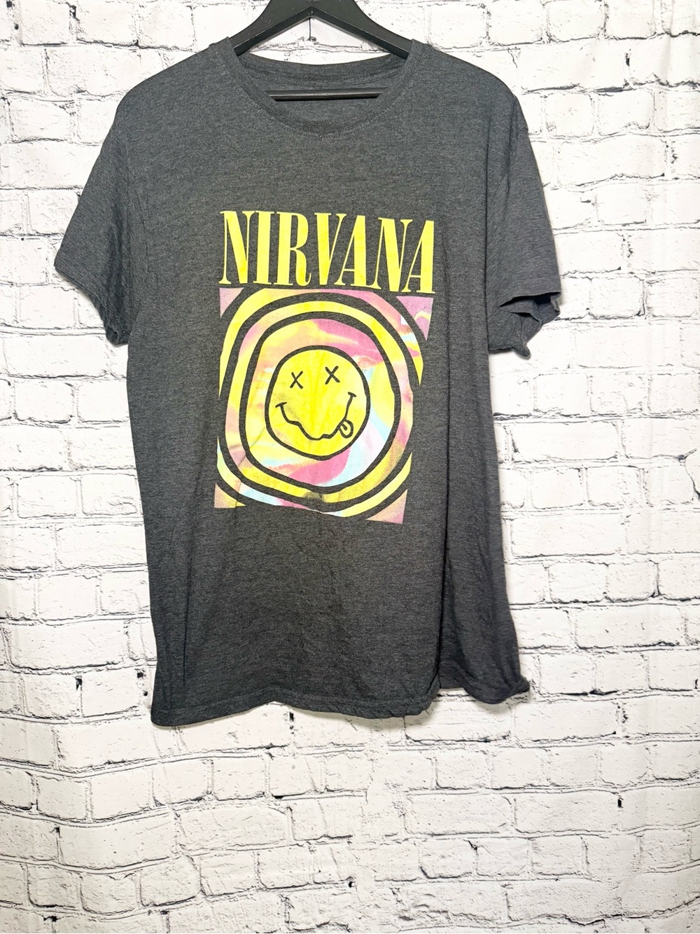 NIRVANA Charcoal Short-Sleeve Tee with Yellow and Pastel Swirl Graphic. Size L